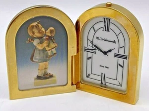 Reloj Hummel vintage de latón Kiss Me Girl con muñeca - Imagen 1 de 8
