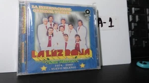 La Internacional Original y Unica La Ruz Roja Banda Nuevo Milenio Nuevo! #A1 - Picture 1 of 2