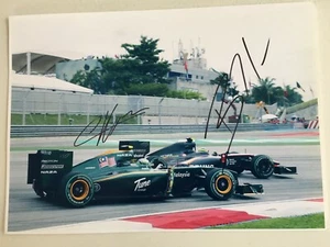 Bruno Senna + Heikki Kovalainen signed Lotus A4 photo - Picture 1 of 2