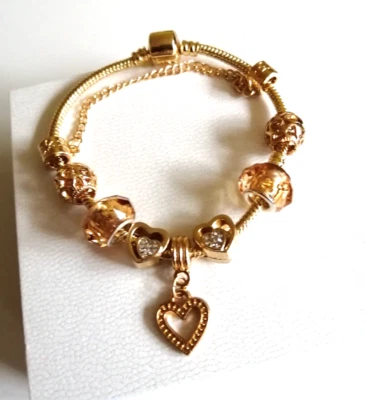 Pandora Armband Stil mit 7 Charms, Wie NEU, Farbe: Gold, Größe: 19 cm - Bild 1 von 3