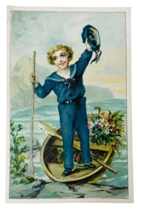 VICTORIAN EPHEMERA – LITTLE BOY IN SAILOR SUIT W/ROWBOAT FULL OF FLOWERS - Picture 1 of 3