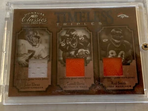 2004 CLASSICS TIMELESS TRIPLES ELWAY, DAVIS, ROD SMITH JERSEY /100 - BRONCOS - Picture 1 of 2