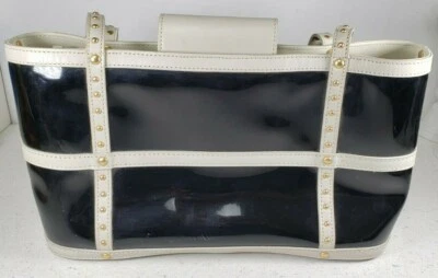Bolso de Mano Maxx New York Negro + Blanco PVC y Cuero con Tachuelas Doradas  Foto 1 de 4