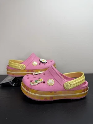 Zuecos Crocs rosa amarillo con campanilla talla 8C9 niño pequeño Foto 1 de 4