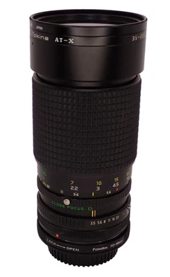 Tokina AT-X 35-200mm f/3.5-4.5 Zoom Lens Canon FD w/ Rear Cap & 67mm Filter - Image 1 of 4