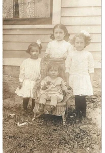 Four little girls with Sunday dresses in yard1900's unmailed b/w photocard - Picture 1 of 2