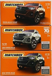 Matchbox 2018 Toyota Hilux Lot Of 3 White Red & Green - Picture 1 of 1