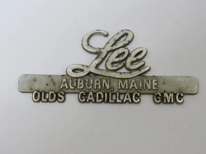 Vintage Lee Oldsmobile-Cad Auburn Maine Metal Dealer Badge Emblem Tag Trunk ME - Picture 1 of 2