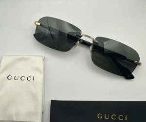 Gucci GG1221s Men Sunglasses Rimless Rectangle Gold Black Metal Frame Gray Lens - Picture 1 of 10