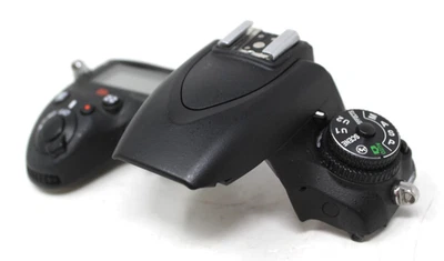 Funda superior Nikon D750 carcasa con botón de placa de flash LCD montaje de pieza flexible Foto 1 de 4