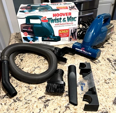 Aspiradora eléctrica de mano Hoover Twist and Aspiradora con accesorios sin bolsa Foto 1 de 4