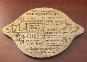 MUD PIE~Natural/Madera~Tabla de cortar en forma de limón~8x5,5~MARGARITAS/Tema de receta~ - Imagen 1 de 2