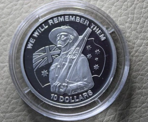 * 2013 KIRIBATI 50% SILVER $10 DOLLAR WE WILL REMEMBER THEM IN CAPSULE #APL21 - Picture 1 of 9