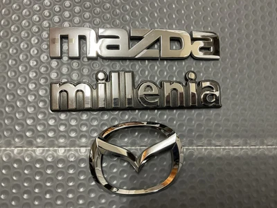 1999-2000-2001-2002 Mazda Millenia  Rear  Trunk Emblems  OEM - Image 1 of 4
