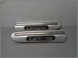 Mercedes W203 Carlsson Kotflügelleisten SET Vorne Leisten Kotflügel Embleme - Bild 1 von 3
