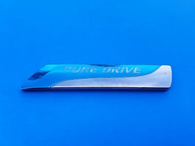 NISSAN ALTIMA SENTRA VERSA JUKE MURANO ROGUE PURE DRIVE EMBLEM LOGO BADGE (2011) - Image 1 of 3