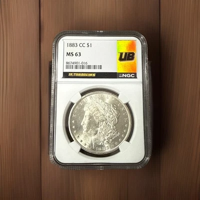 1883-CC $1 NGC MS 63 Morgan Silver Dollar Ultra Breaks Gold Rush Label - Image 1 of 2