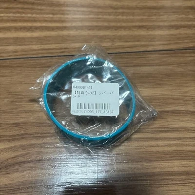 OverTone Rubber Band with a can Badge - Image 1 of 3