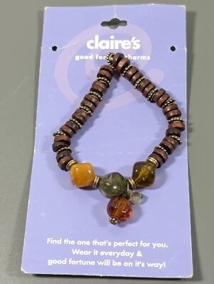 Pulsera Claires Good Fortune Charm Tribal Color Ámbar Vidrio Cuentas Elásticas 7 pulgadas Foto 1 de 4
