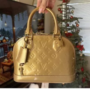 Louis Vuitton, gold patent leather Alma BB bag with strap - Picture 1 of 10