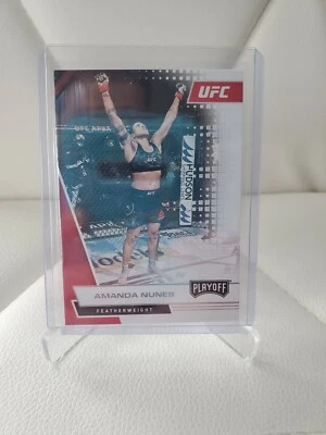 2021 PANINI CHRONICLES UFC PLAYOFF #64 AMANDA NUNES MINT - Image 1 of 2