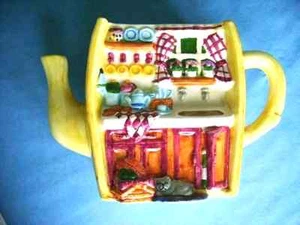 Maceta decorativa de cerámica con tema de cocina en el frente amarilla con varios colores - Imagen 1 de 12