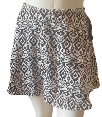 NUEVO CON ETIQUETAS Minifalda Attention Para Mujer Talla Pequeña Elástica Negra Blanca Estampado Abstracto Foto 1 de 4