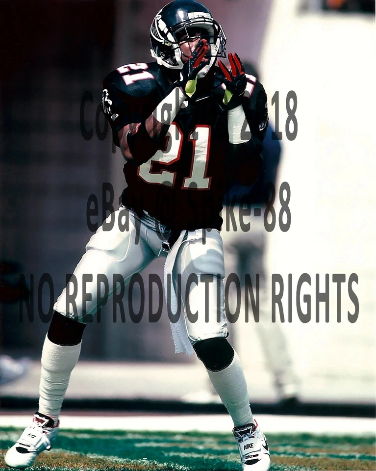 DEION SANDERS ATLANTA FALCONS CATCHING KICKOFF 1990's - Image 1 of 1