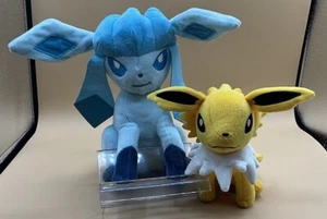 A pair of Pokémon Tomy Eevee/Jolteon lot of two - Picture 1 of 3