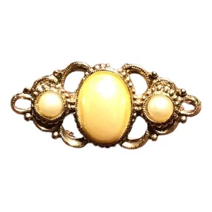 Broche vintage 1928 Jewelry Co. falso cabujón perla - Imagen 1 de 5