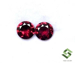 Coppia pietre preziose sfuse granato rodolite naturale certificato taglio tondo 6 mm 2,00 CTS - Foto 1 di 8