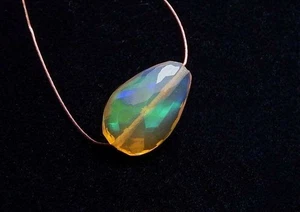 ETHIOPIAN OPAL 15mm Faceted Nugget Focal Bead Purple/Green - Picture 1 of 2