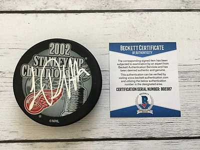 Luc Robitaille Firmado 2002 Red Wings Stanley Cup Hockey Puck Beckett BAS CERTIFICADO DE AUTENTICIDAD b Foto 1 de 4