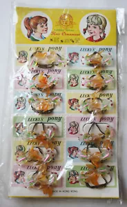12X VINTAGE 70'S ELASTIC BEND HAIR ORNAMENTS GIRLS BARRETTES HONG KONG NEW NOS ! - Picture 1 of 6