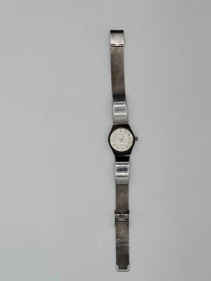 Reloj Bijoux Terner funcionando con batería nueva caja tono marrón con correa plateada  Foto 1 de 4