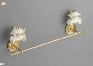PORTA ASCIUGAMANI IN CERAMICA AVORIO/ORO DETTAGLIO CARROZZA - Foto 1 di 1