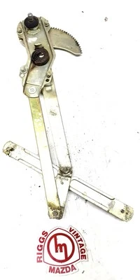 Mecanismo regulador de bobinadora ventana delantera derecha mazda rx3 808 cupé Foto 1 de 2