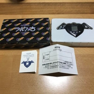 L'Arc-en-Ciel Larkutchi Tamagotchi 1998 Realidad Virtual Mascota Negra con Caja Raro - Imagen 1 de 7