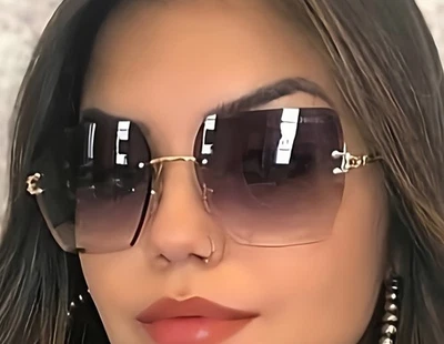 Gafas de sol estilo diseñador para mujer Foto 1 de 4