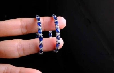 Pendientes de aro con clip de zafiro azul simulado de corte ovalado enchapados en oro blanco de 14 k Foto 1 de 4