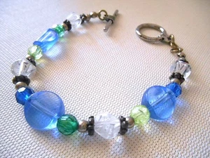Pulsera con cuentas multicolor azul y verde plateado - Imagen 1 de 4