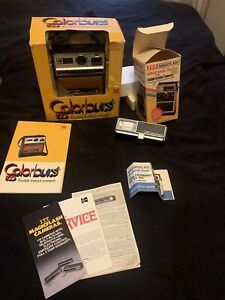 Kodak Colorburst A-100 Instant Camera and ITT Magic Flash EF-246. Untested.