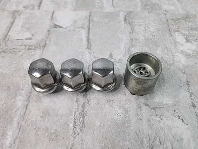 Juego de 4 cerraduras de rueda de repuesto originales McGard removedor de orejetas OEM Foto 1 de 4