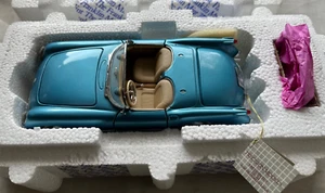 A Franklin mint scale model of a 1 955 Chevrolet corvette. - Picture 1 of 12