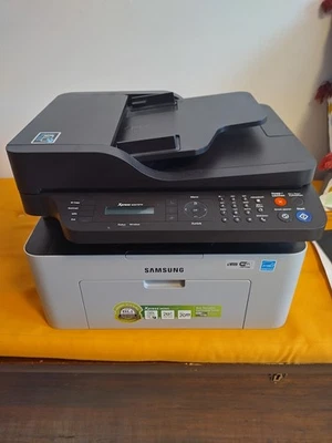 Samsung M2070FW Multifunzione Laser Bianco e Nero, Funzione Fronte/Retro - Immagine 1 di 4