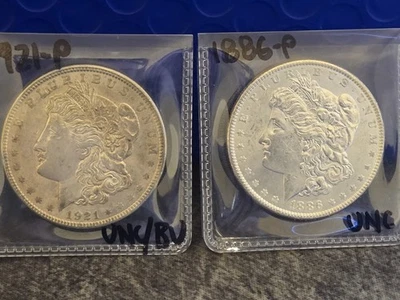 Lote de 2: 1886 y 1921 P UNC+ Dólares de Plata Morgan - 90% Plata - Foto 1 de 4