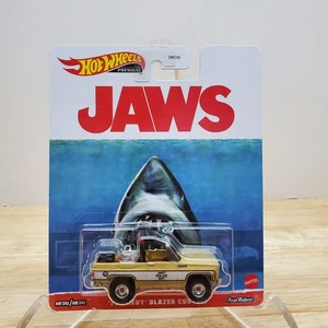 HOT WHEELS POP CULTURE SERIE 1975 CHEVY BLAZER CUSTOM "JAWS" W/ REAL RIDERS - Picture 1 of 7