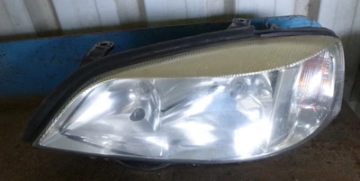 Holden Astra TS 98-05 Left Headlight (chrome insert) D - Image 1 of 3