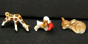 Mini giraffa giapponese, scarpa rossa per cani e cervo bambino - Foto 1 di 2