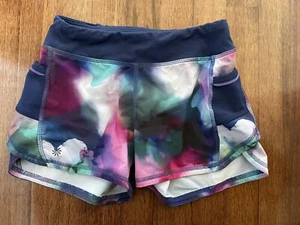 ATHLETA Girl Shorts Sz M 8/10 RECORD BREAKER Pockets 2.0 Athletic Running NICE! - Picture 1 of 5